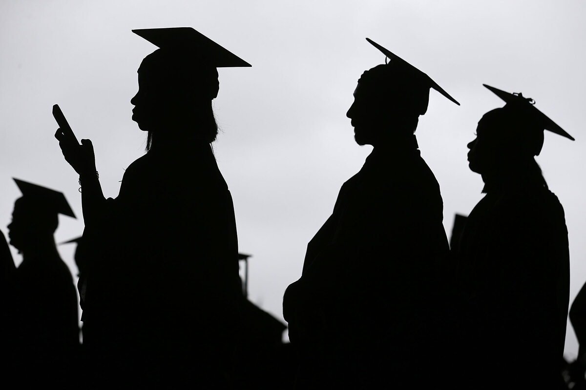 New graduates line up before the Bergen Community College commencement in New Jersey, May 17, 2018. Although some student loan debt has been canceled recently, the federal government is now seeking repayment of delinquent loans.